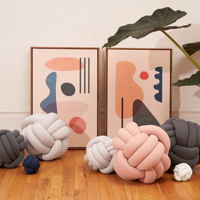 Coussin tricoté relaxant – Forme nouée