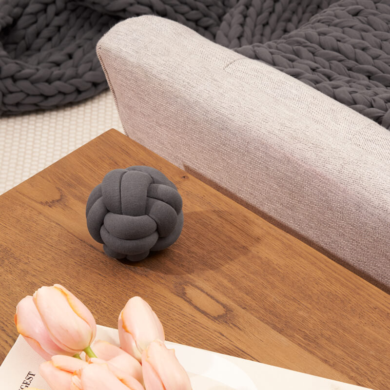 Coussin tricoté relaxant – Forme nouée